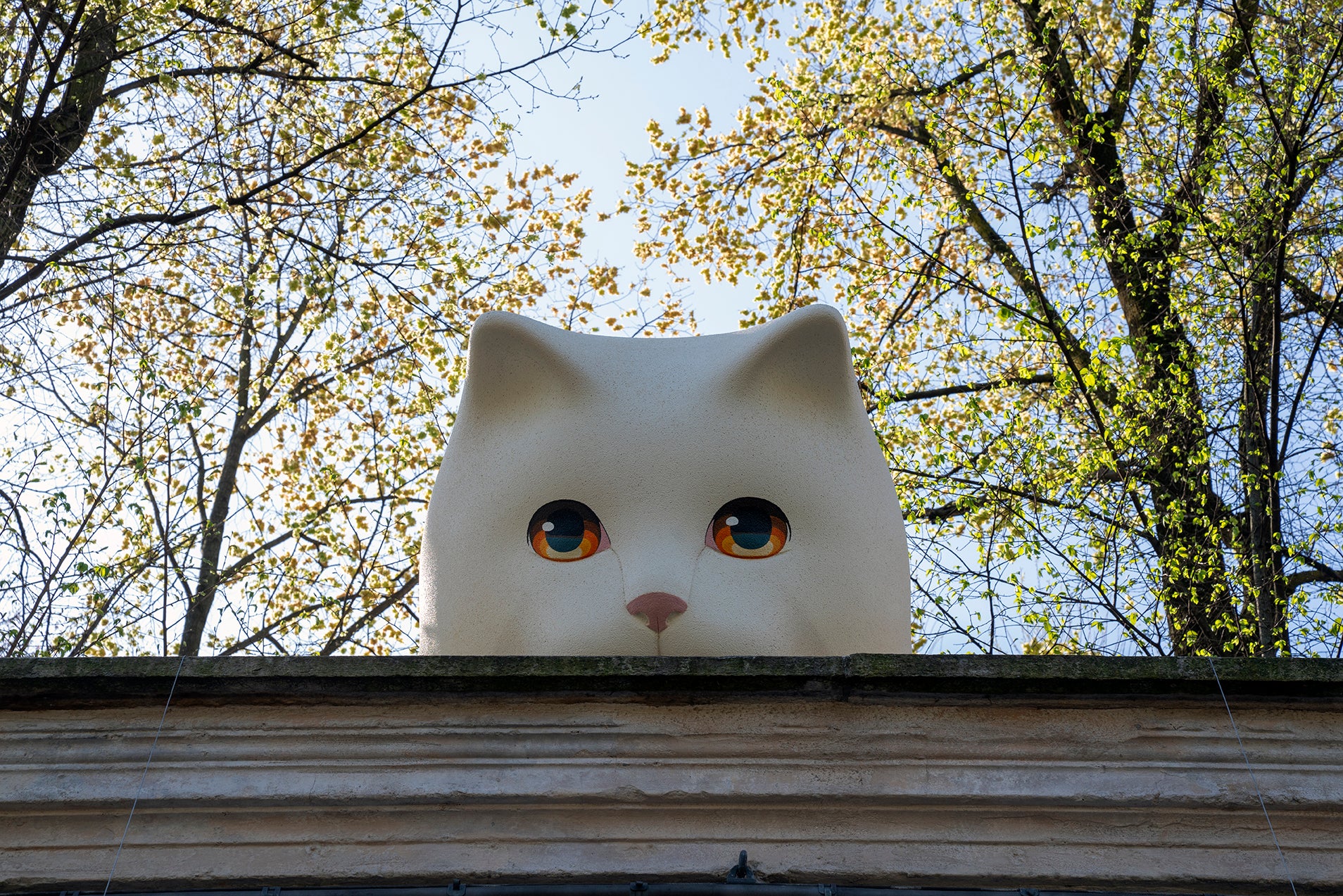 Pet Therapy™ x MCM installation at Milano Design Week 2025 featuring giant sculpture Bò, a kitten design piece.