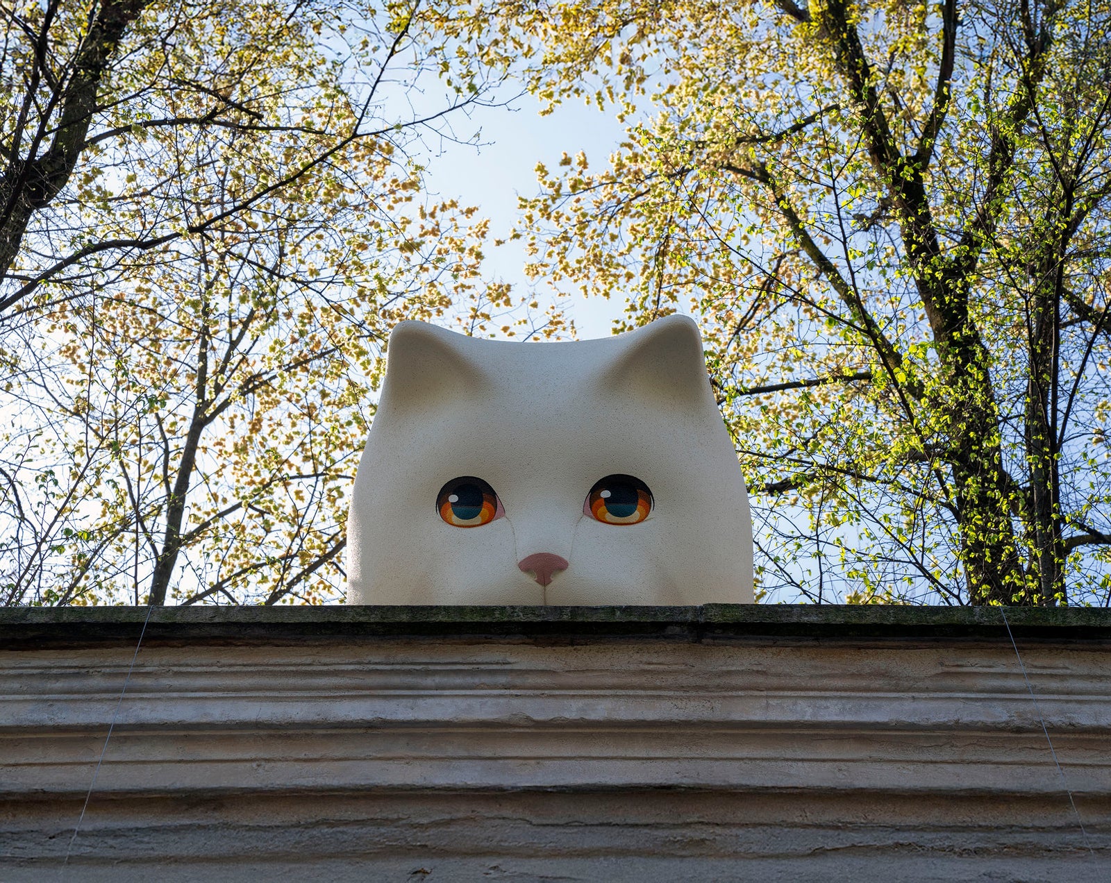 Pet Therapy™ x MCM installation at Milano Design Week 2025 featuring giant sculpture Bò, a kitten design piece.