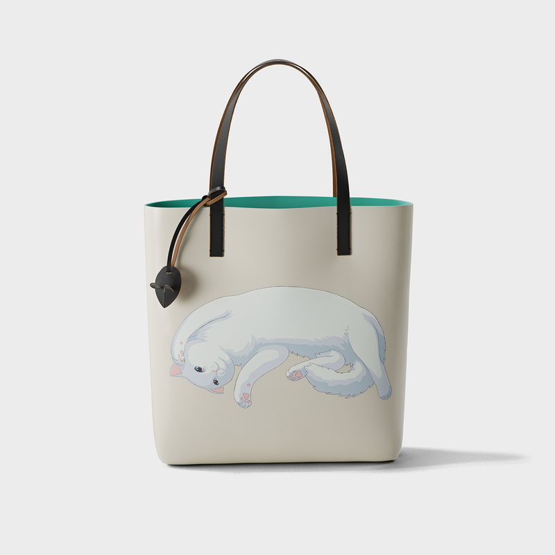 Pet Therapy™ color-block tote bag in deadstock PVC with leather handles, cartoon cat print and mouse charm.