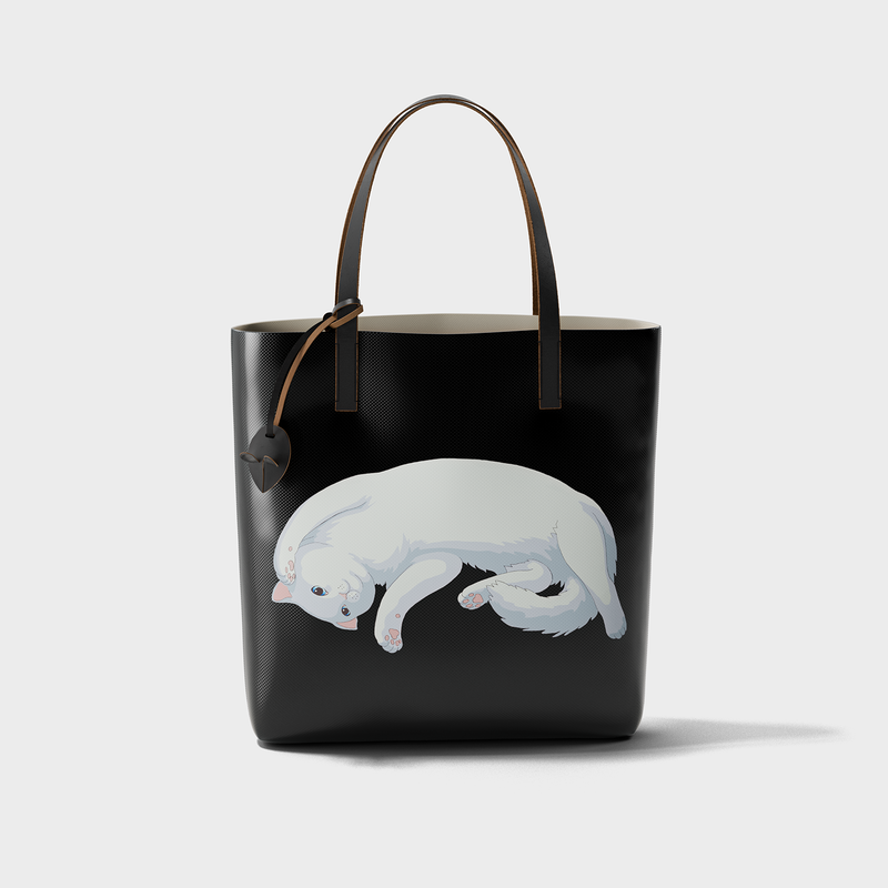 Pet Therapy™ color-block tote bag in deadstock PVC with leather handles, cartoon cat print and mouse charm.