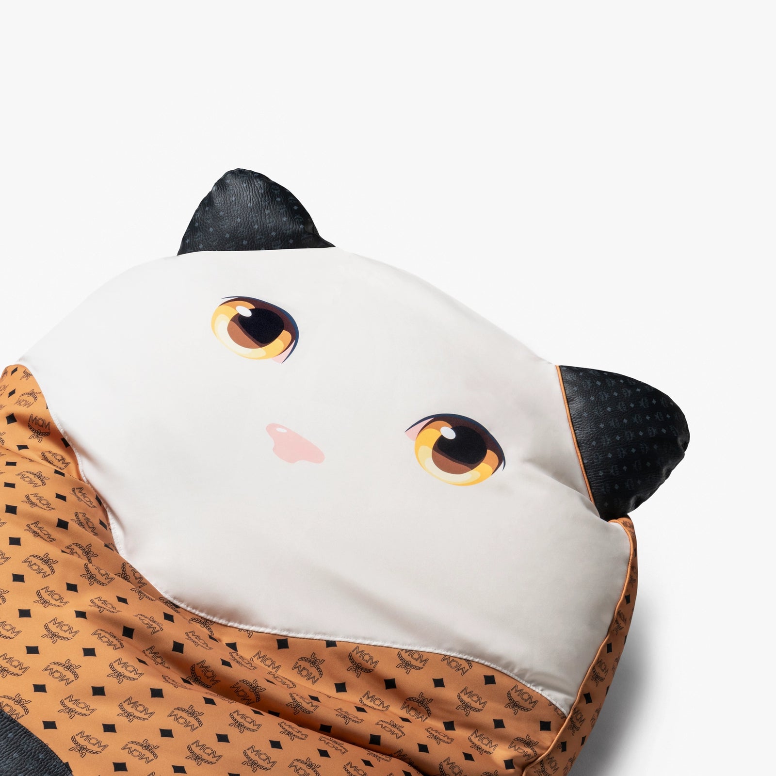 Close-up of Mao Pouf by Pet Therapy x MCM, highlighting the upcycled Visetos fabric texture and soft handcrafted finish.