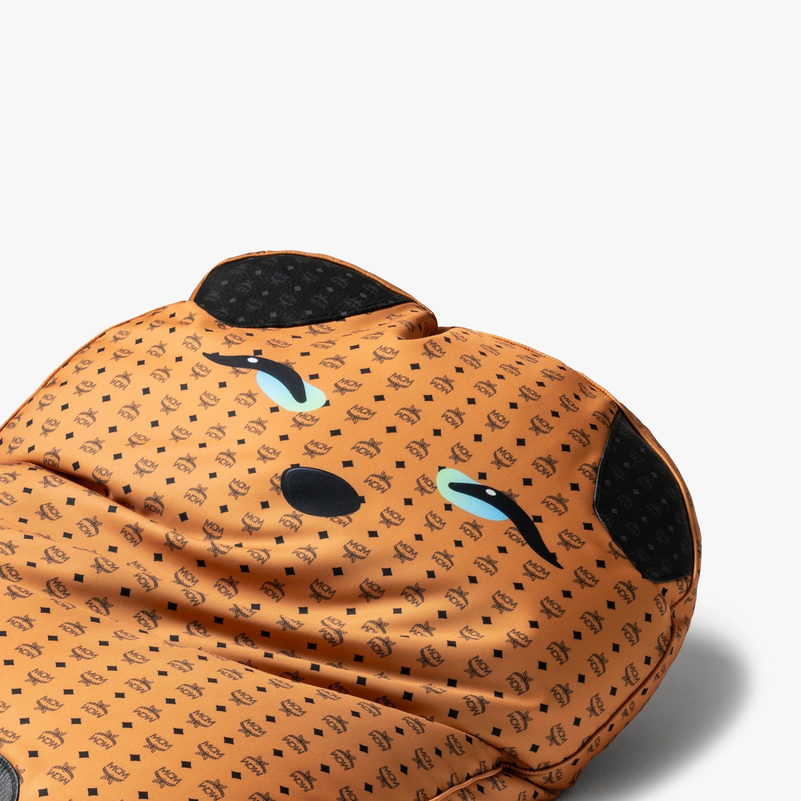 Close-up of Bao Pouf by Pet Therapy x MCM, highlighting the upcycled Visetos fabric texture and soft handcrafted finish.