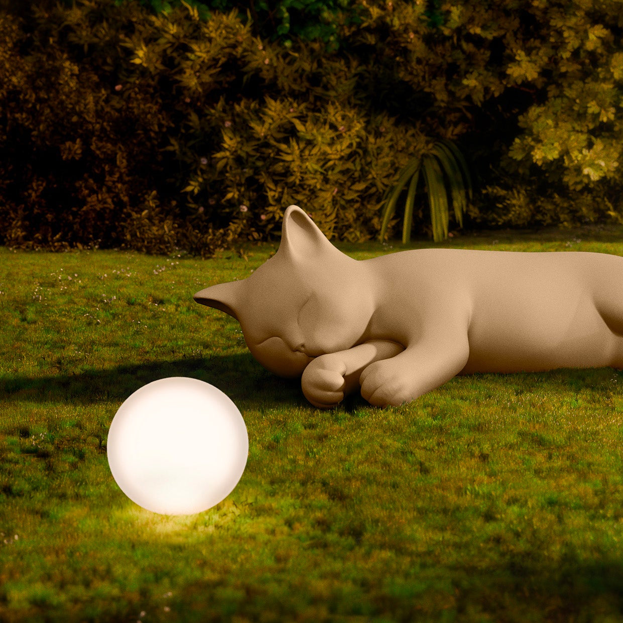 Milù by Pet Therapy™ — giant cat-shaped sculpture and seat, displayed in an outdoor garden setting.