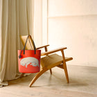 Pet Therapy™ color-block tote bag in deadstock PVC with leather handles, cartoon cat print and mouse charm.