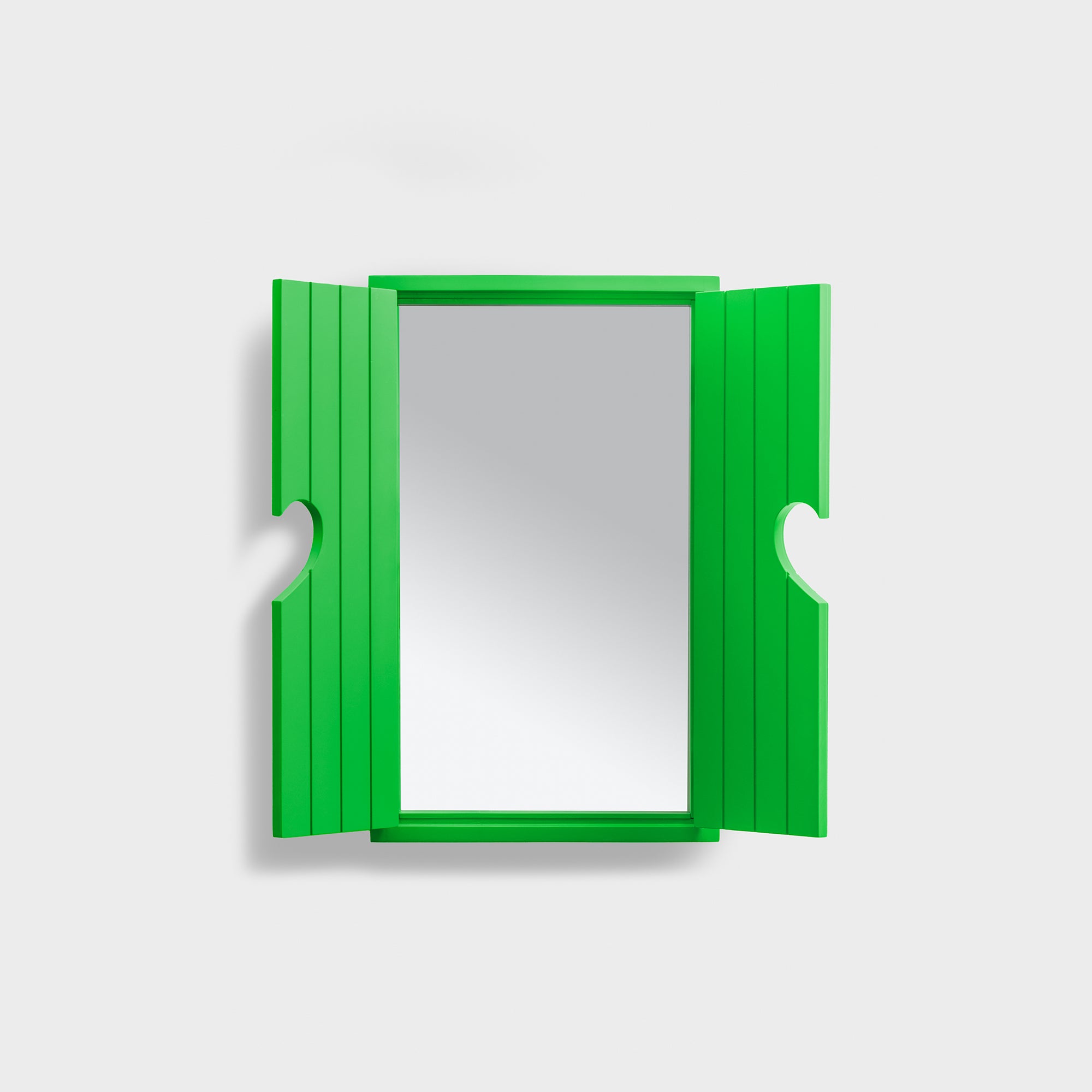 Engadina wall mirror by Pet Therapy™ with lacquered green wooden frame and functional shutters.