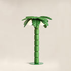 Palm Beach floor lamp by Pet Therapy™ – palm-shaped LED lamp with powder-coated metal structure and recycled PL fabric padding.