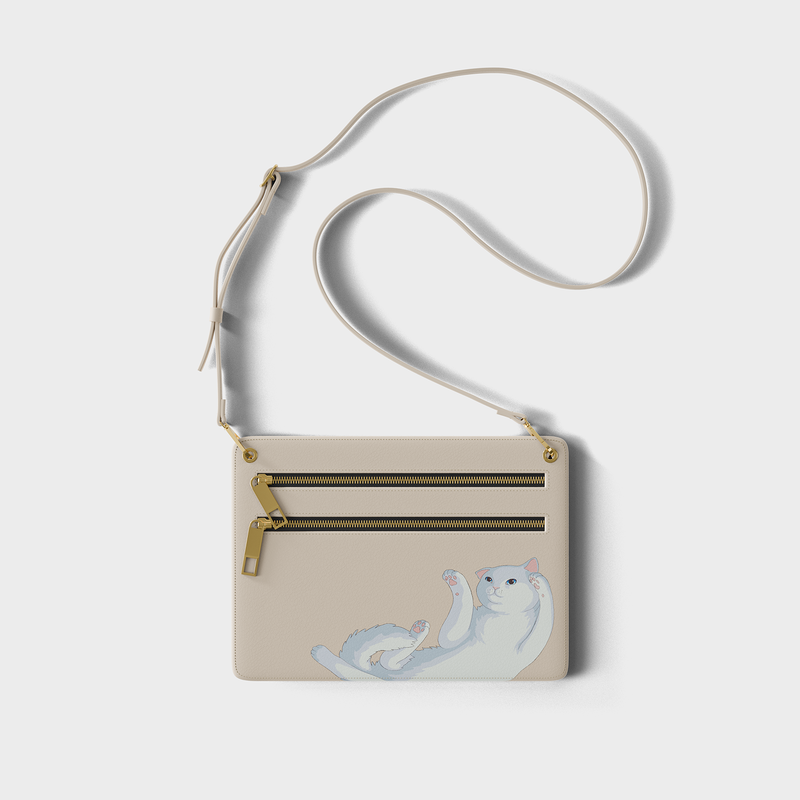 Birba Pouch Bag by Pet Therapy™ – leather bag with cat logo, gold zippers, and detachable strap.