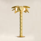 Palm Beach floor lamp by Pet Therapy™ – palm-shaped LED lamp with powder-coated metal structure and recycled PL fabric padding.